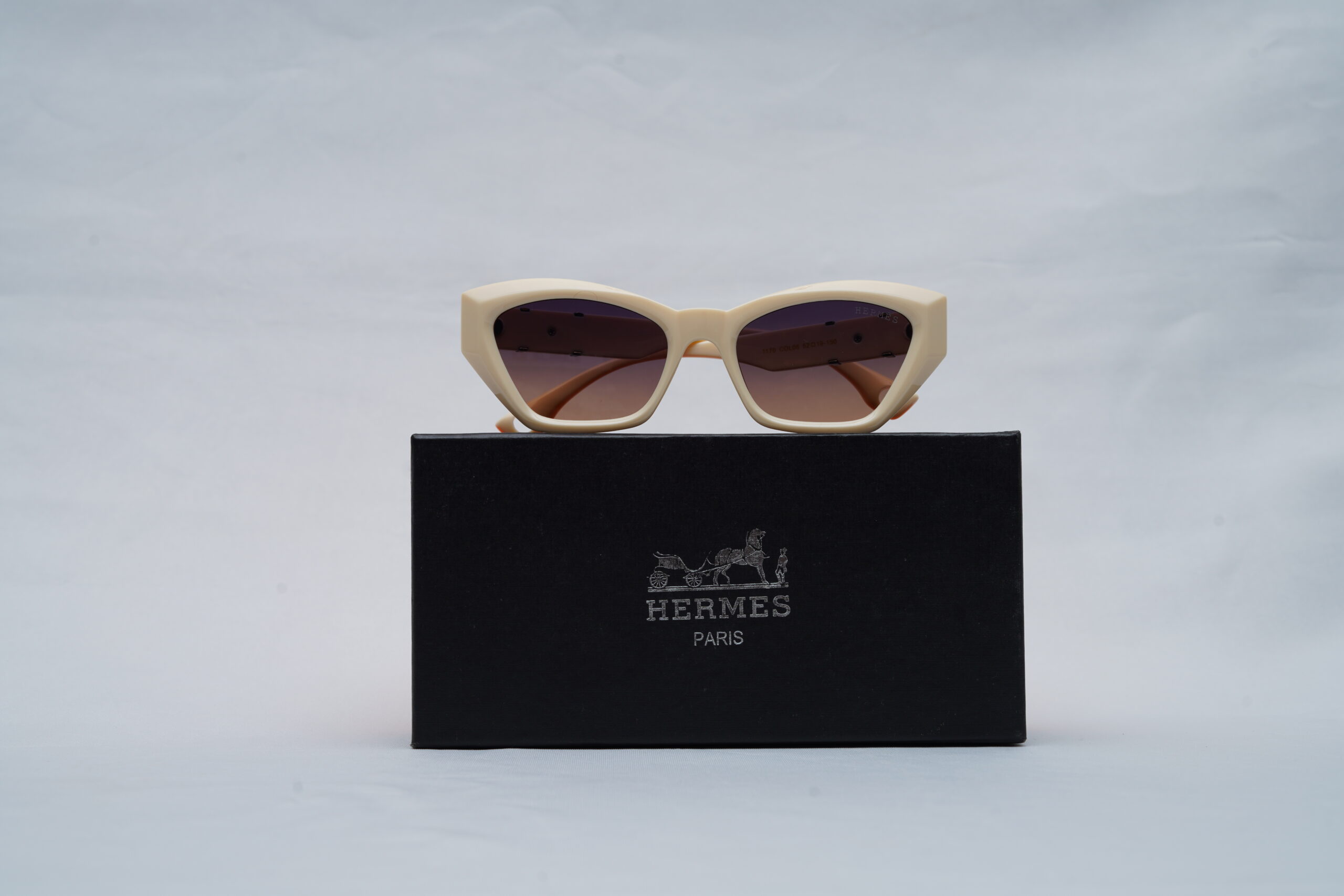 Hermès Angular Cat-Eye Statement Sunglasses in Ivory Cream