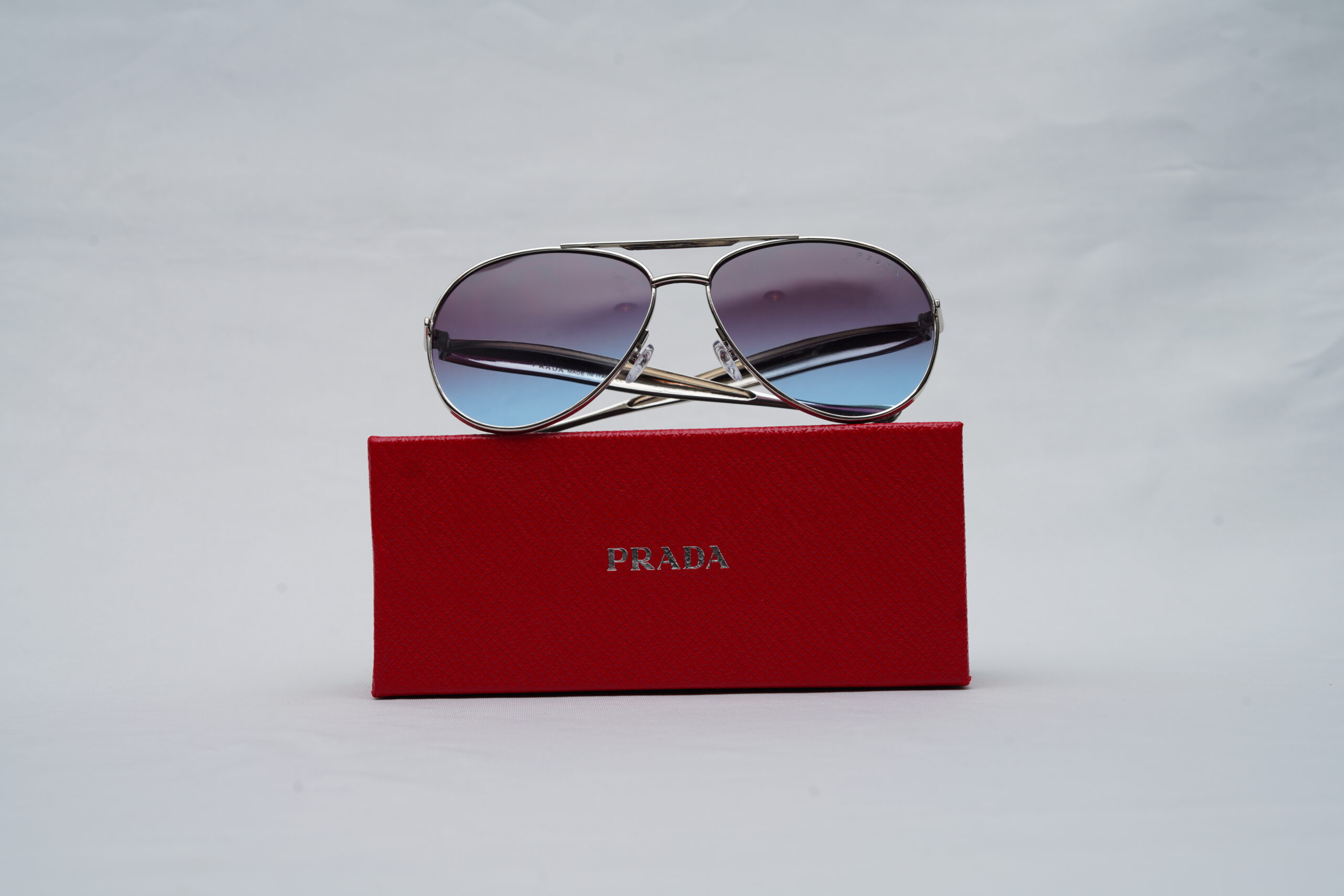 PRADA Silver Double-Bridge Pilot Shades with Gradient Blue Lenses