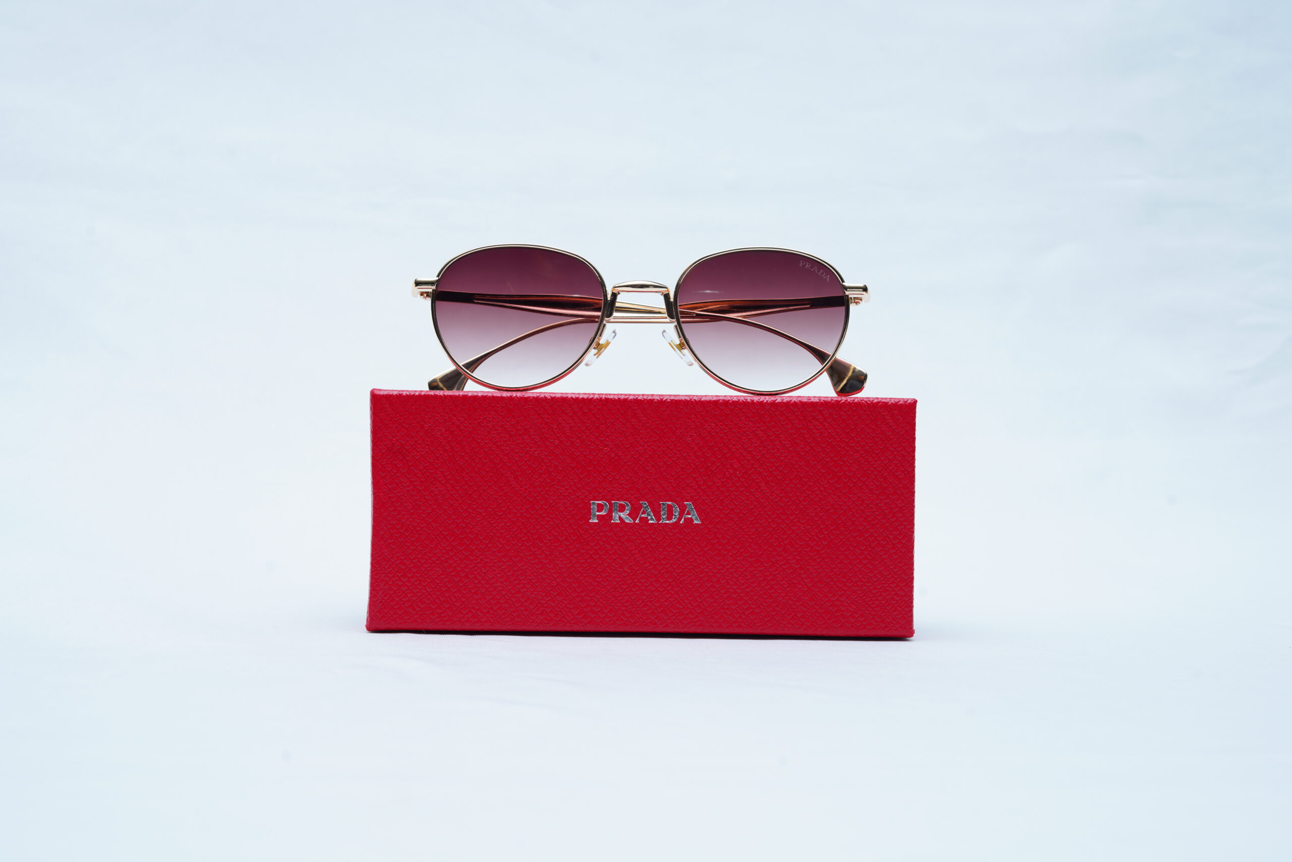 PRADA Gold Wire Round Pilot Shades – Luxury Brown Gradient Sunglasses