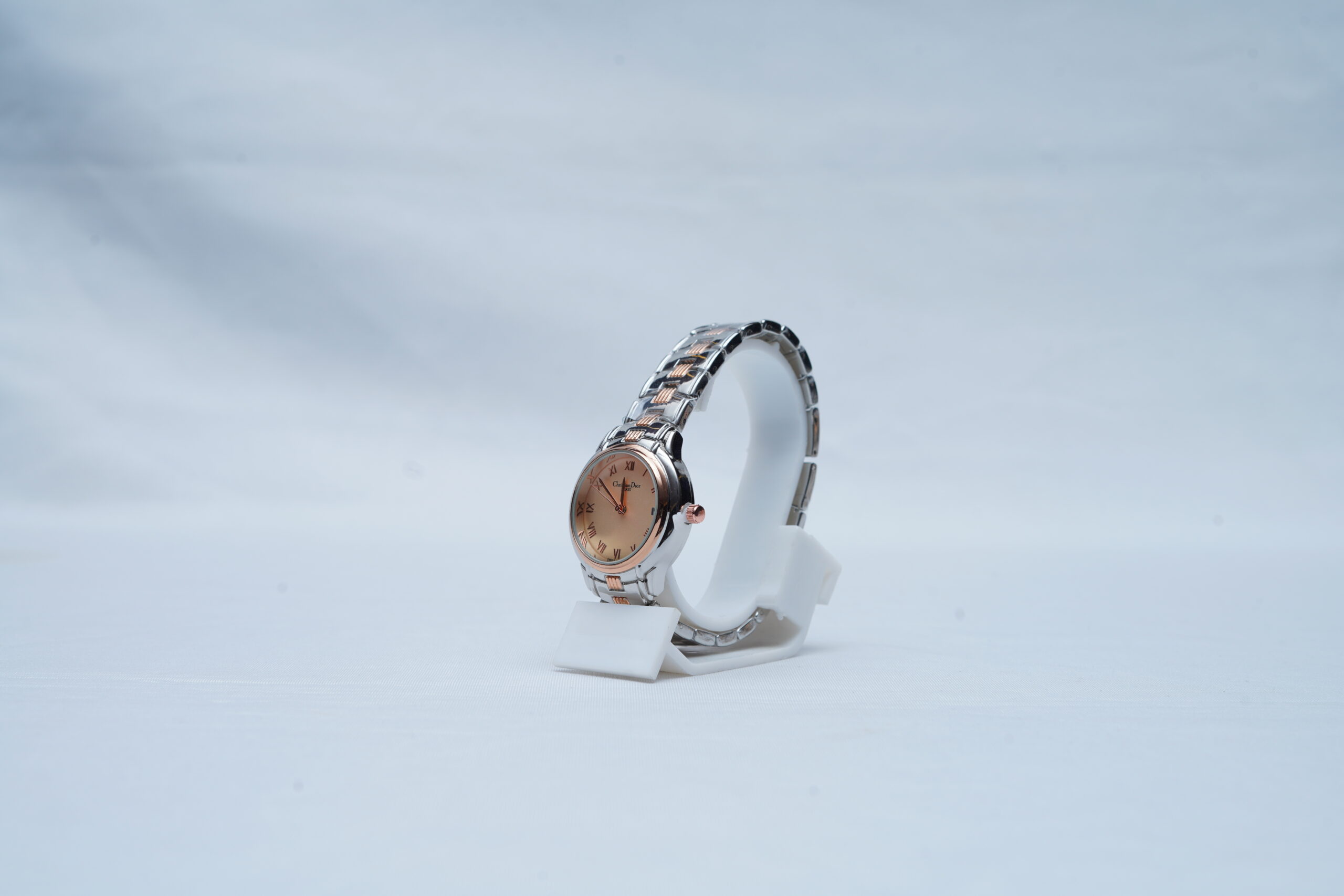 Meticulously crafted with a premium Two-Tone Link Bracelet, the watch showcases the perfect harmony between radiant rose gold and brilliant silver finishes. The elegant case design exudes understated luxury, while the refined dial layout emphasizes simplicity, balance, and timeless beauty. Designed as a versatile dress timepiece, it offers a sophisticated presence suitable for formal occasions, professional settings, and elevated everyday wear.